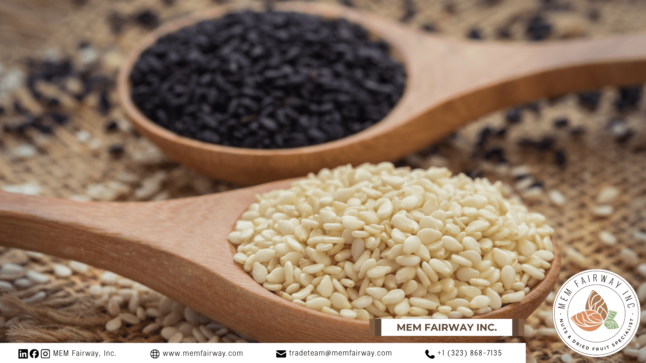 Black and white sesame seeds on wooden spoon